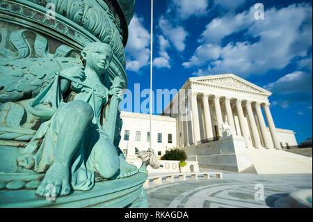 Bright sunny view of the facade of the Supreme Court of the United States building with a close-up of a cherub [by architect Cass Gilbert, 1935] Stock Photo