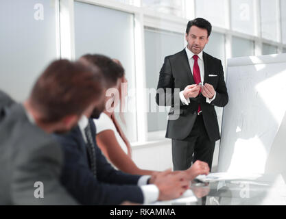 business team listens to the lecturer at the business presentation.photo with copy space Stock Photo