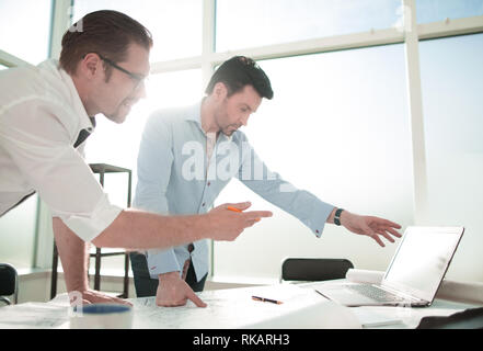 two architects developing a new project . the concept of professionalism. Stock Photo