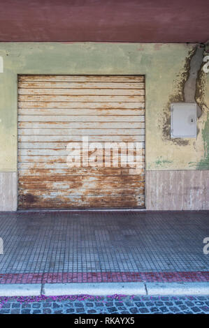 Closed shop, failed work activity, rusty shutter Stock Photo