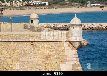The Turrets And Walls Of Forte da Ponta da Bandeira Lagos Portugal Guarding The Harbour Stock Photo