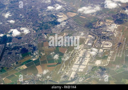 Aerial view of Charles de Gaulle in Paris, France on a sunny, summer day.  The smaller Le Bourget airfield is towards the top of the picture. Stock Photo