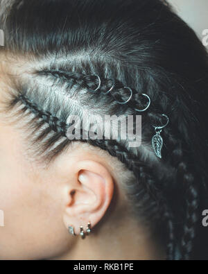 female mohawk pigtails cornrows womans braids Stock Photo