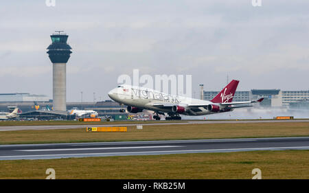 Virgin Alantic Boeing 747-400, G-VBIG, named Tinker Belle, takes off at Manchester Airport Stock Photo