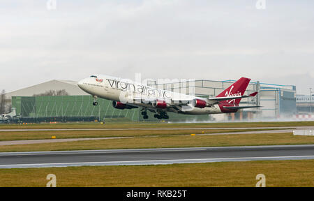 Virgin Alantic Boeing 747-400, G-VBIG, named Tinker Belle, takes off at Manchester Airport Stock Photo