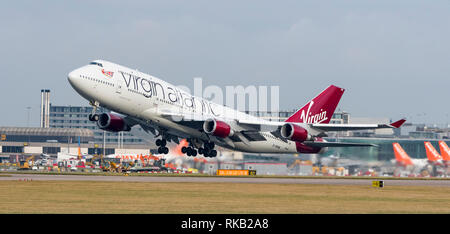Virgin Alantic Boeing 747-400, G-VROM, named Barbarella, takes off at Manchester Airport Stock Photo