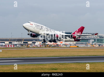 Virgin Alantic Boeing 747-400, G-VROM, named Barbarella, takes off at Manchester Airport Stock Photo