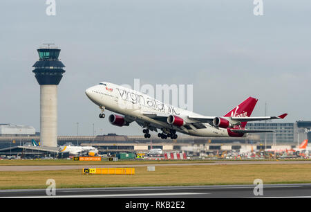Virgin Alantic Boeing 747-400, G-VROM, named Barbarella, takes off at Manchester Airport Stock Photo