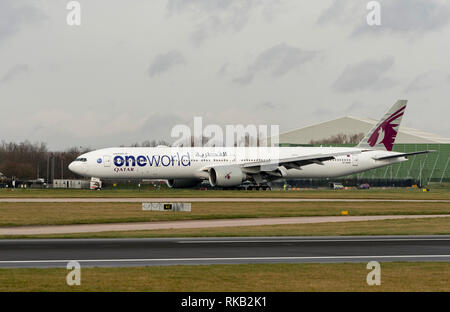 Qatar Airways 737-3DZ(ER)  A7-BAB in 'One World' llivery at Manchester Airport Stock Photo