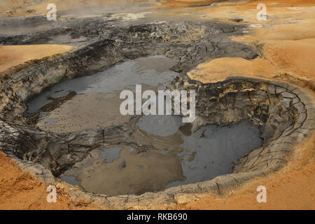 Boiling mud pots at Namafjall, a popular tourist spot in Iceland. Stock Photo