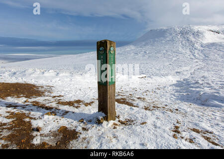 A footpath sign post showing the Pennine Way below Kinder Scout in the Derbyshire Peak District. Stock Photo
