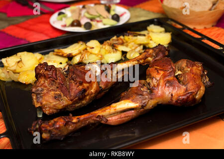 close-up of  homemade roast lamb with potatoes an salad Stock Photo