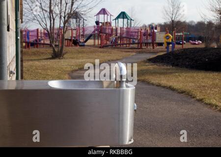 Warminster, Pennsylvania, USA - February 6, 2019: Drinking fountain at a community park occupying the site of a former naval air base. Stock Photo