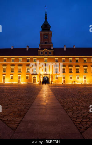 Royal Castle at night in city of Warsaw in Poland, view from Great Courtyard to Zygmunt Tower. Stock Photo