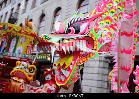 A dragon prop seen standing on a float on Duncannon Street in central London ahead of the annual Chinese New Year Parade. Chinese New Year itself and the start of the Year of the Pig fell on February 5, with London's Overseas Chinese community holding their main celebrations, including the annual parade on the 10th February. Stock Photo
