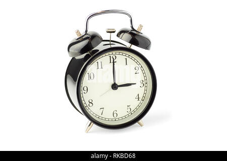 Black alarm clock with two bells on white background Stock Photo