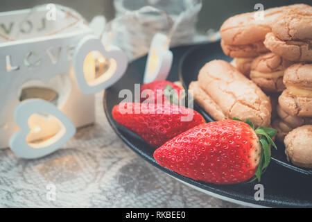 Pancakes from puff pastry with strawberries, European homemade. Homemade biscuits for tea. Close-up Stock Photo