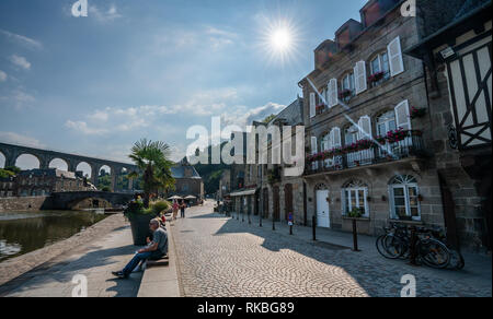 Picturesque Dinan Port river view on with sun rays and blue sky. Stock Photo