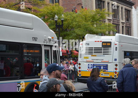 MBTA Buses celebrating the 2018 Red Sox World Series Championships at the Championship Parade along Boylston Street, Back Bay, Boston, Massachusetts Stock Photo