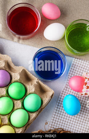 Easter painted eggs background. Eggs and paints. Stock Photo