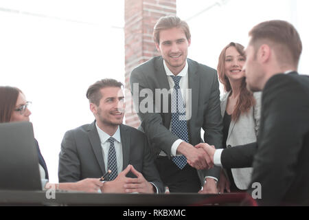 Confident businessmen sitting by table during consultation Stock Photo