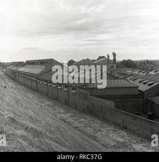 1950s, exterior of a single-storey industrial, warehouse typl unit with ...