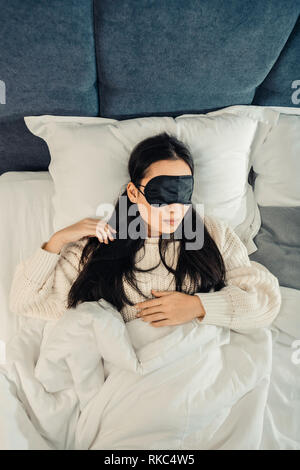 Young woman feeling amazing while sleeping at home Stock Photo