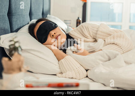 Close up of young beautiful woman feeling good while sleeping Stock Photo