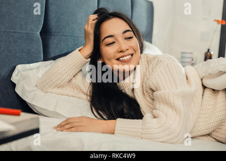 Cheerful woman feeling energetic and motivated in the morning Stock Photo