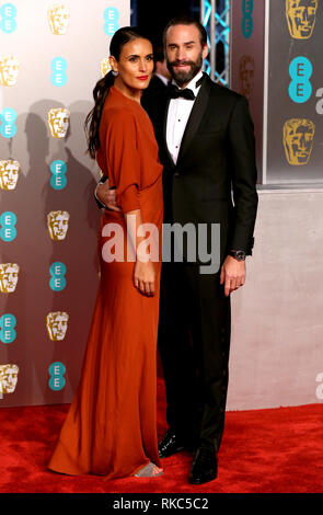 Maria Dolores Dieguez and Joseph Fiennes attending the 72nd British Academy Film Awards held at the Royal Albert Hall, Kensington Gore, Kensington, London. Stock Photo