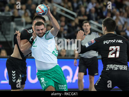 Zagreb, Croatia. 10th Feb, 2019. Eivind Tangen (2nd L) of Skjern Handbold vies with Tin Kontrec (L) of PPD Zagreb during the 11th round of VELUX EHF Champions League handball match between PPD Zagreb and Skjern Handbold in Zagreb, Croatia, Feb. 10, 2019. PPD Zagreb won 32-29. Credit: Jurica Galoic/Xinhua/Alamy Live News Stock Photo