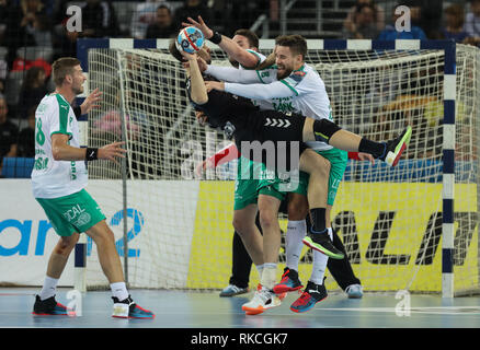 Zagreb, Croatia. 10th Feb, 2019. Luka Mrakovic (in black) of PPD Zagreb vies with Jonathan Stenbacken and Thomas Mogensen of Skjern Handbold during the 11th round of VELUX EHF Champions League handball match between PPD Zagreb and Skjern Handbold in Zagreb, Croatia, Feb. 10, 2019. PPD Zagreb won 32-29. Credit: Jurica Galoic/Xinhua/Alamy Live News Stock Photo