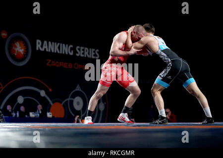 Zagreb, Croatia. 10th Feb, 2019. Bozo Starcevic (L) of Croatia competes with Yunus Emre Basar of Turkey during the men's Greco-Roman 77kg final match of Wrestling at the 2019 UWW Zagreb Open Grand Prix in Zagreb, Croatia, Feb. 10, 2019. Bozo Starcevic claimed the title. Credit: Igor Kralj/Xinhua/Alamy Live News Stock Photo