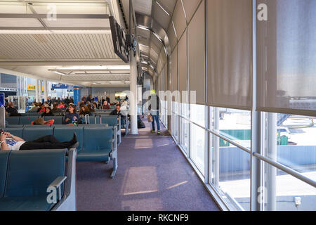 CHICAGO - APRIL 05, 2016: inside of O'Hare International Airport. O'Hare is currently a major hub for American Airlines and United Airlines, as well a Stock Photo