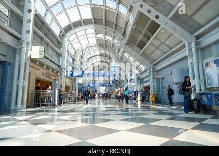 CHICAGO - APRIL 05, 2016: inside of O'Hare International Airport. O'Hare is currently a major hub for American Airlines and United Airlines, as well a Stock Photo