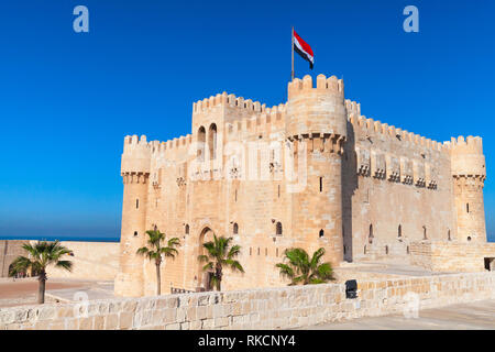 The Citadel of Qaitbay or the Fort of Qaitbay is a 15th-century defensive fortress located on the Mediterranean sea coast, Alexandria, Egypt. It was e Stock Photo