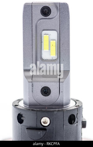 An automotive LED headlight close-up on an isolated background Stock Photo