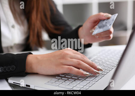 Female arm hold bunch of credit cards Stock Photo