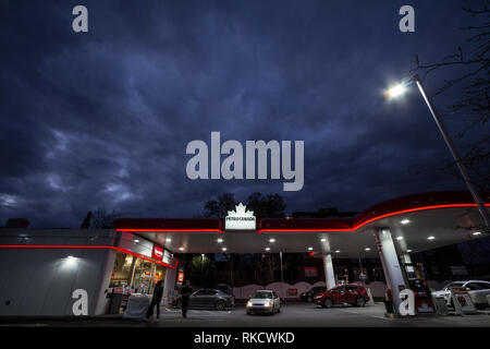 MONTREAL, CANADA - NOVEMBER 8, 2018: Petro-Canada logo in front of one of their gas stations in Canada. Belonging to Suncor Energy, petro Canada is a  Stock Photo