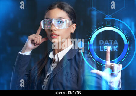 Business, Technology, Internet and network concept. Young businessman working on a virtual screen of the future and sees the inscription: Data leak Stock Photo
