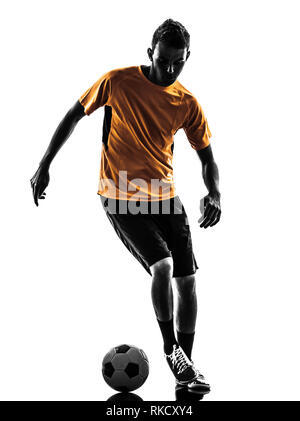 one  young man soccer player orange jersey in silhouette on white background Stock Photo