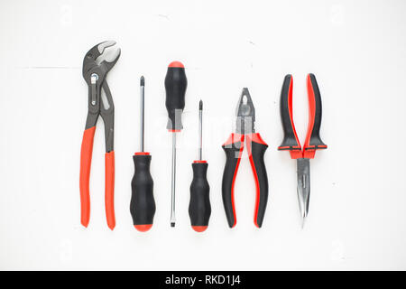 Set of hand tools. Different work tools: pliers and screwdrivers Stock Photo