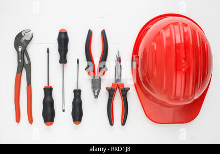 Various hand tool equipment on white table Stock Photo