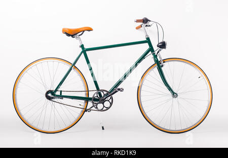 Bicycle on white background. Studio shot of retro styled bicycle Stock Photo