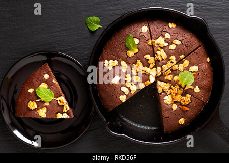 Food concept Homemade Brownies baked in iron cast skillet with copy space Stock Photo