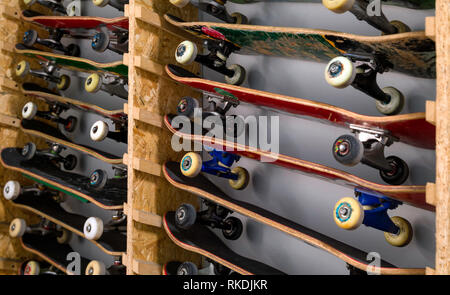 Skateboards on the shelf from above Stock Photo