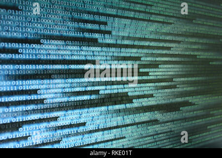 binary data on computer monitor. multiple layers of codes streaming signifying transferring information over internet medium. Stock Photo