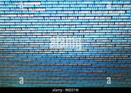 binary data on computer monitor. multiple layers of codes streaming signifying transferring information over internet medium. Stock Photo