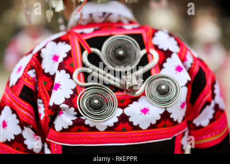 Qiandongnan. 11th Feb, 2019. Photo taken on Feb. 11, 2019 shows silver accessories of a villager of Miao ethnic group in Cenzui Village of Langdong Township in Rongjiang County, southwest China's Guizhou Province. Local people on Monday invited lusheng performing teams from neighbouring villages to celebrate the Spring Festival, or the Chinese Lunar New Year, together. Credit: Huang Wanxin/Xinhua/Alamy Live News Stock Photo