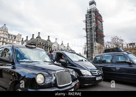 London, UK. 11th February, 2019. Licensed taxi drivers, or black cab drivers, block Parliament Square as part of a protest against taxis being excluded from Bank Junction, Tottenham Court Road, Tooley Street and areas of Greenwich, Lewisham, Islington and Hackney. Credit: Mark Kerrison/Alamy Live News Stock Photo